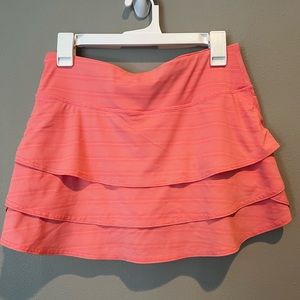 Women’s Athleta skort size Medium in coral.